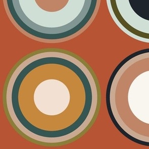 Circles in taupe brown, grey, beige, olive green, orange, salmon red, apricot on terra cotta