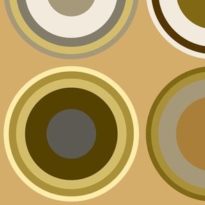 Circles in grey, white, brown, olive green, yellow on tan brown