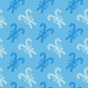 Blue and White Peppermint Candy Cane Stick with Bow Vector Seamless Pattern