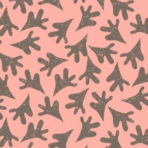 Taupe Brown  Leaves Tossed in Non Directional Pattern on Coral with Faux Texture Medium Scale