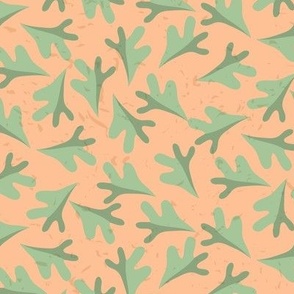 Tossed Two Tone Leaves in Soft Pastel Green on Pantone Peach Fuzz  Ground with Faux Texture Medium  Scale