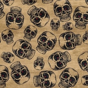Spooky skulls with glowing red eyes on natural background