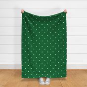 White Polka Dots on a Forest Green Background