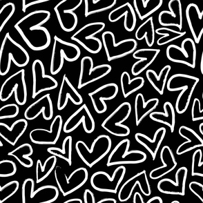 Hand drawn chalk white hearts on black background