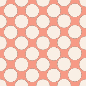 cream dot on coral background