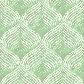 Abstract blockprint Optical Art petals with 3D effect, pastel pistachio green on creme white