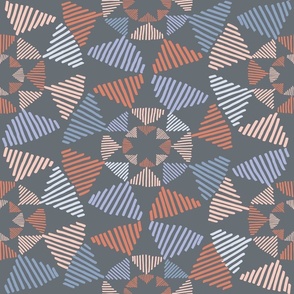 Colorful stylized radiant star motif seamless pattern