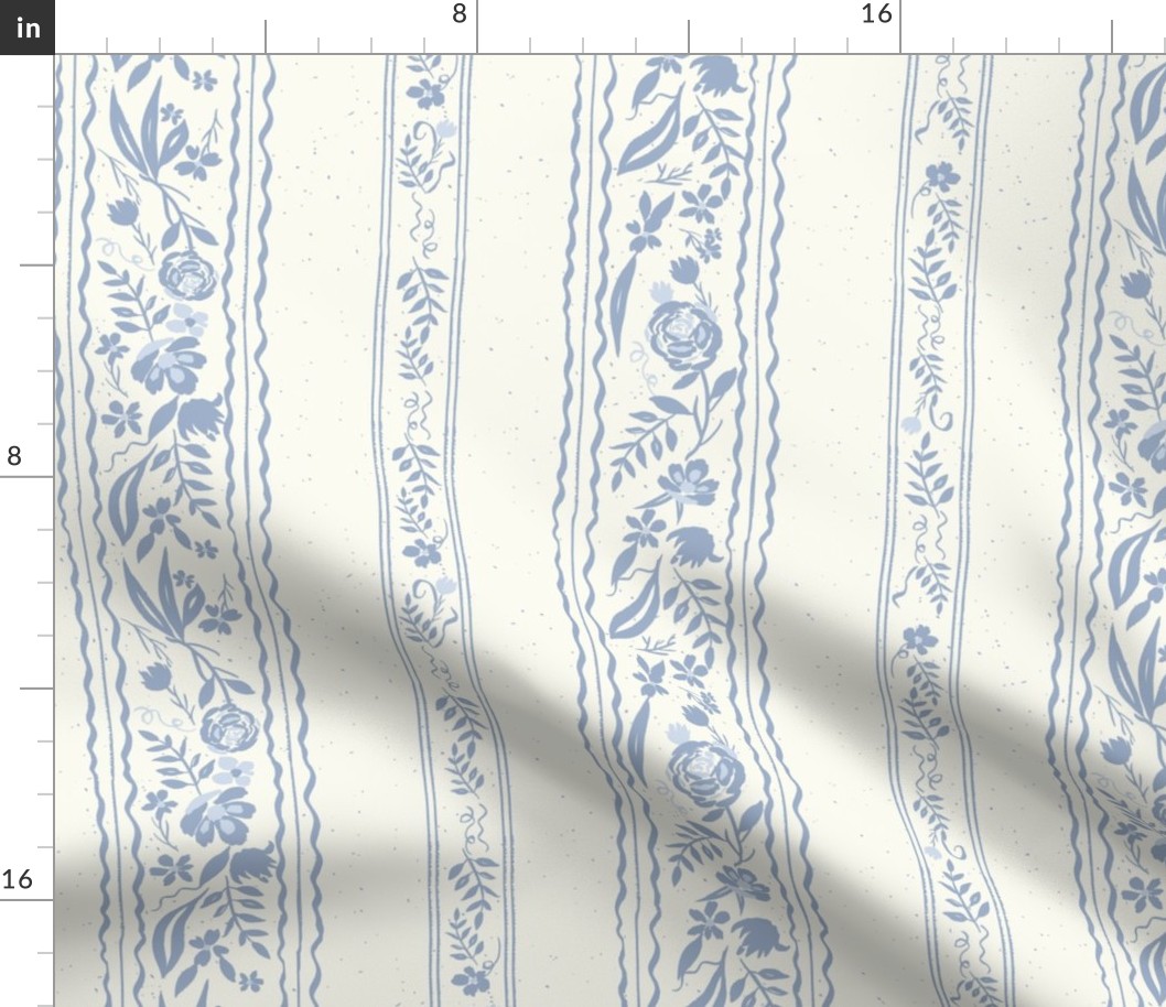 vintage dusty blue floral and ribbon stripe on textured creamy background 