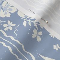  vintage creamy floral and ribbon stripe on textured mountain blue background