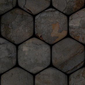 Large, darkly rustic industrial texture behind a black hex-grid