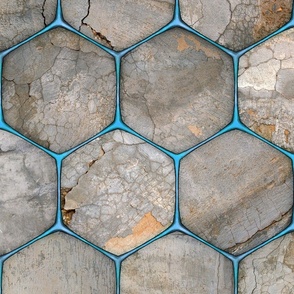 Large, rustic industrial concrete texture behind a glowing blue hex-grid