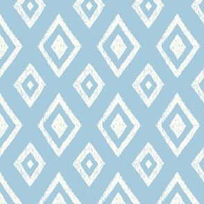 Ikat classic diamond Indie global textile pattern in natural white on light French blue, small scale