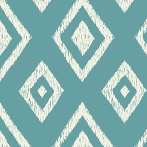 Ikat classic diamond Indie global textile pattern in green mist on teal green, medium scale