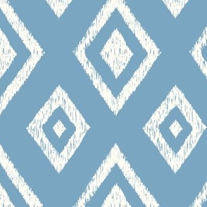 Ikat classic diamond Indie global textile pattern in natural white on French blue, medium scale