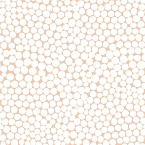 Dots in white and random on tan