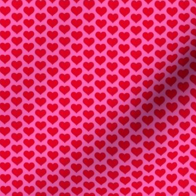 Red hearts on pink, micro scale