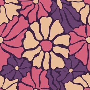 Groovy retro flowers in pink and purple colors