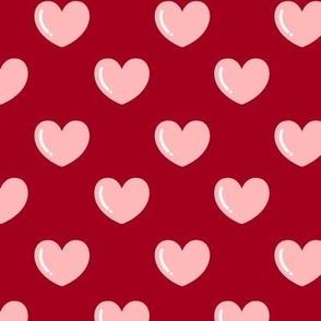Pink Hearts on a Red Background 