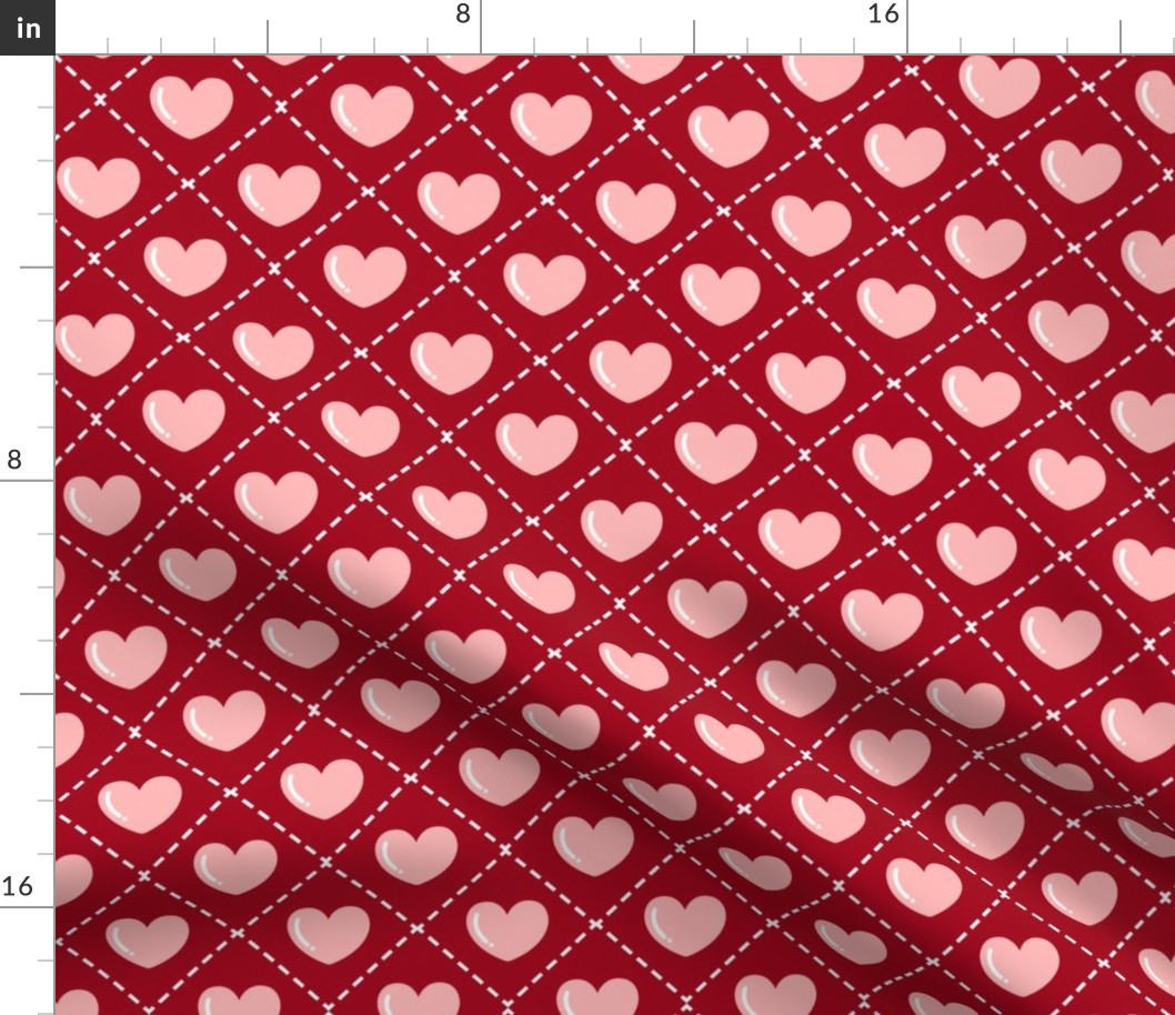 Quilted Pink Hearts on a Red Background