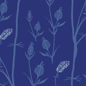 Indigo block print marsh grass and poppy seedpods in Blue