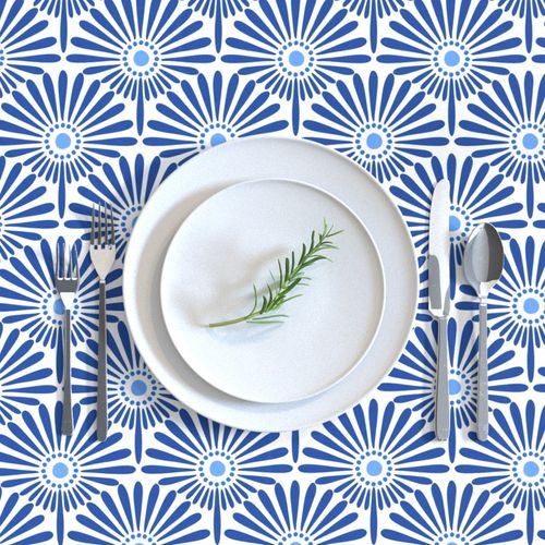 Geometric floral sunflower scallop design Delft China blue and white hues