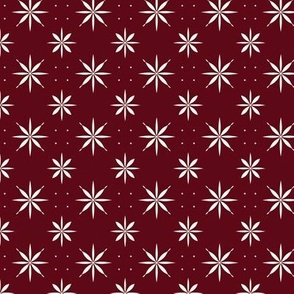 Maroon color background and white snowflakes