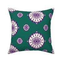 Geometric block print blooms in green & purple featuring circles of poppy seeds florets for nature-inspired living decor, wallpaper & bedding