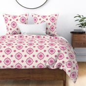 Geometric block print blooms in ivory & pink featuring circles of poppy seeds florets for nature-inspired living decor, wallpaper & bedding
