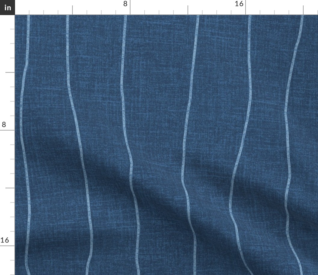 Wide - Chambray denim grungy, wavy, hand drawn stripes on an indigo blue, faux denim woven textured background. 