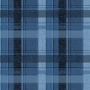 Large - Chambray, indigo and stonewashed denim blue stripes create a plaid or tartan effect. 