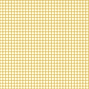 White polka dots on a yellow background 