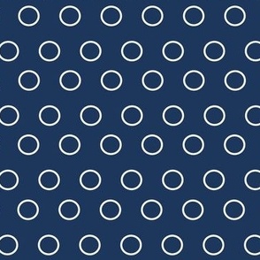White open dots or circles on blue