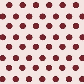 Burgundy polka dots on dusky pink.
