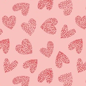 Hand drawn hearts and dots in dark and light pink red