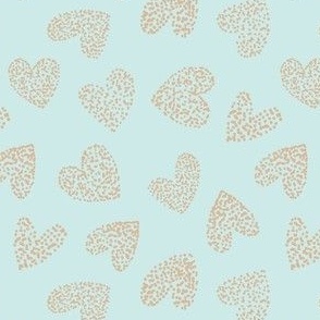 Hand drawn hearts and dots in light teal and light chocolate brown
