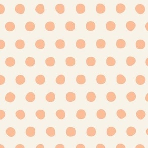 Polka dots in peach fuzz and light creme