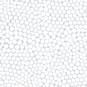 Dots in white and random on blue