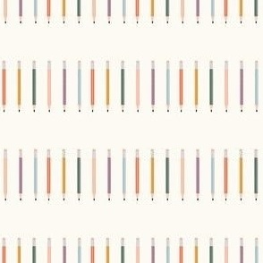 Colorful Striped Pencils on Cream