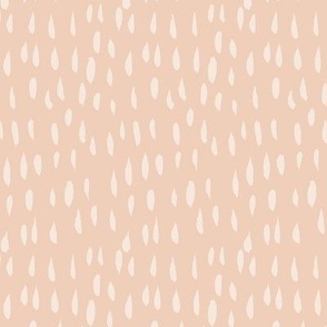 Creamy raindrop speckle on pantone peach fuzz background for home decor