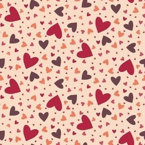 Mini small scale tossed heart pattern in cool reds, warm blush and brown for children's apparel, kids décor, pet accessories, valentines day projects and quilting