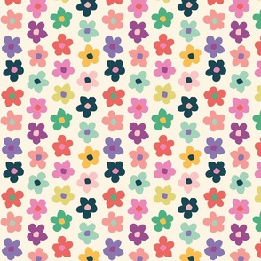 BOLD DAISY ON CREAM BACKGROUND WITH GREENS AND PINKS