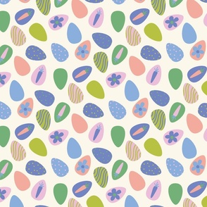 easter eggs blue and peach on cream background