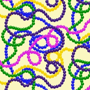 Mardi Gras Beads on Pale Yellow