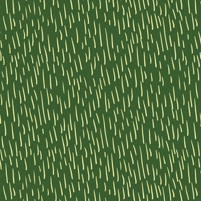Small yellow brush strokes on pine green background
