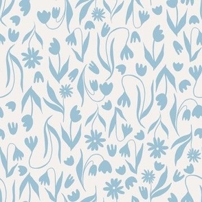 Wildflower Silhouette Scatter Pattern in Blue and light tan.  Lovely as a quilting blender, or as a fun wallpaper.