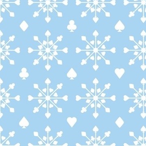 White snowflakes and cards suits