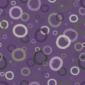 Hand painted organic, concentric circles in shades of pale lilac and dusky lavender, soft mint and greens tossed on a rich eggplant purple background. A lovely bedroom wallpaper.