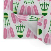 Badminton shuttlecocks in preppy-inspired pink and green on white