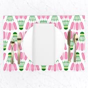 Badminton shuttlecocks in preppy-inspired pink and green on white