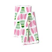 Badminton shuttlecocks in preppy-inspired pink and green on white